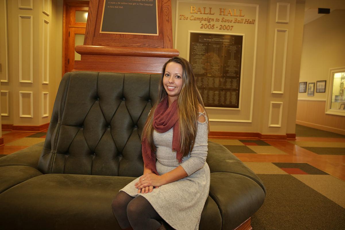 Kate Ellis sitting in Ball Hall's main level seating area