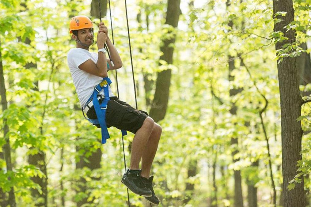 A student using the Keuka College ropes course