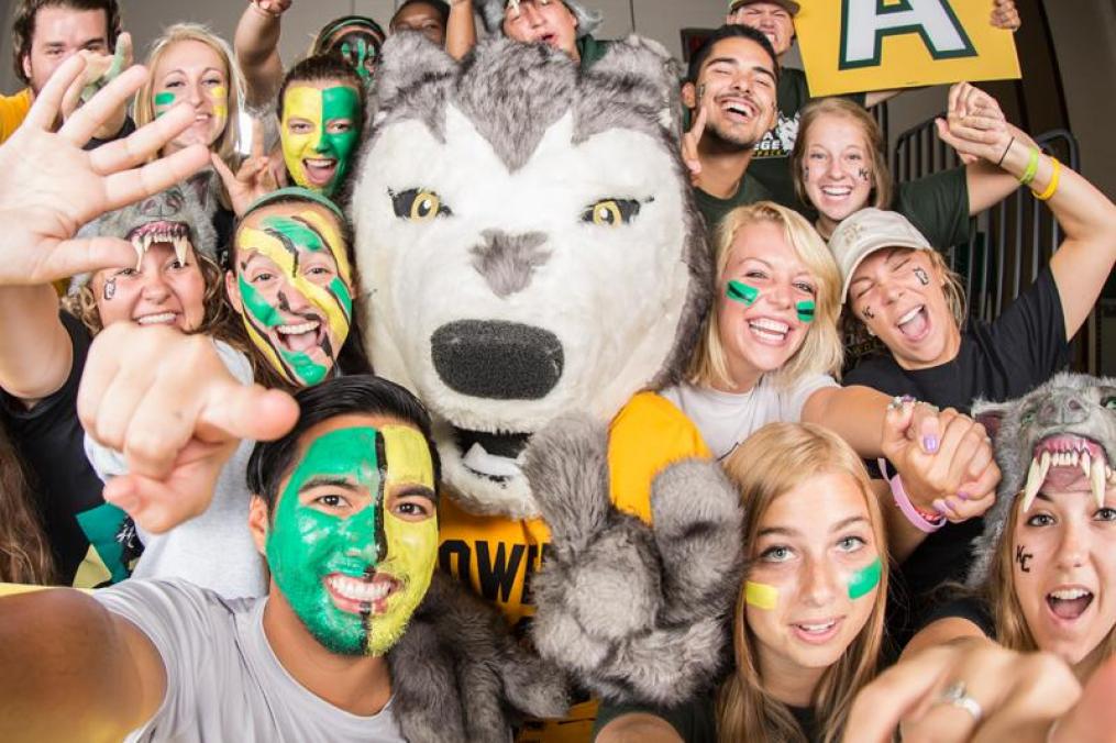 Students in a group with Kacey the Wolf
