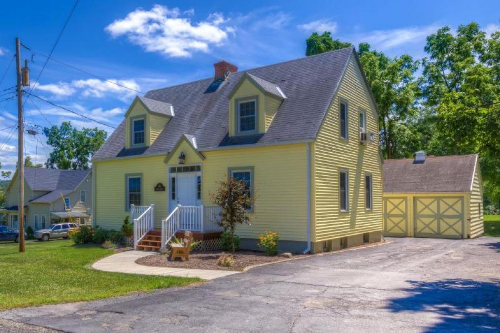 The yellow guest house next to the Alumni house