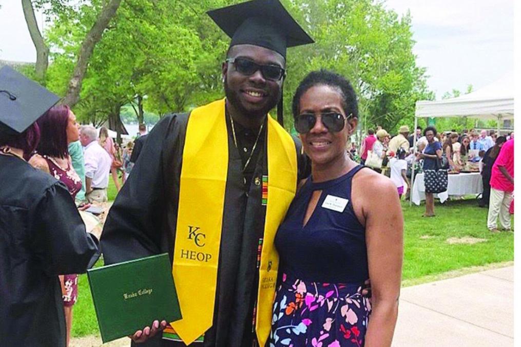 Marvin Duncan '18 poses with HEOP Director Lisa Thompson during his May 2018 graduation.
