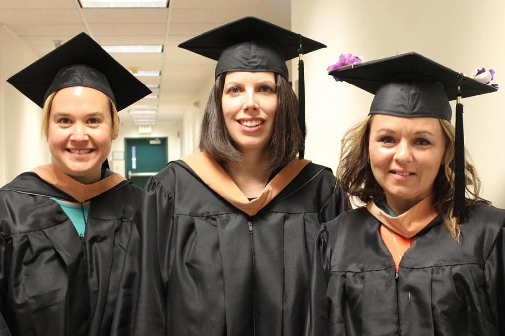 MSM grads, from left, Rena Terwilliger, Jenn Rivers, and Autumn Norman share a moment.