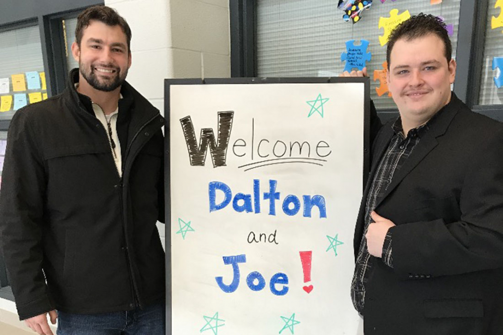 Joe Maier '16 M'17 (left) poses with Dalton Letta before their presentation, "No One Eats Lunch Alone," at Canalview Elementary School in Spencerport, N.Y.