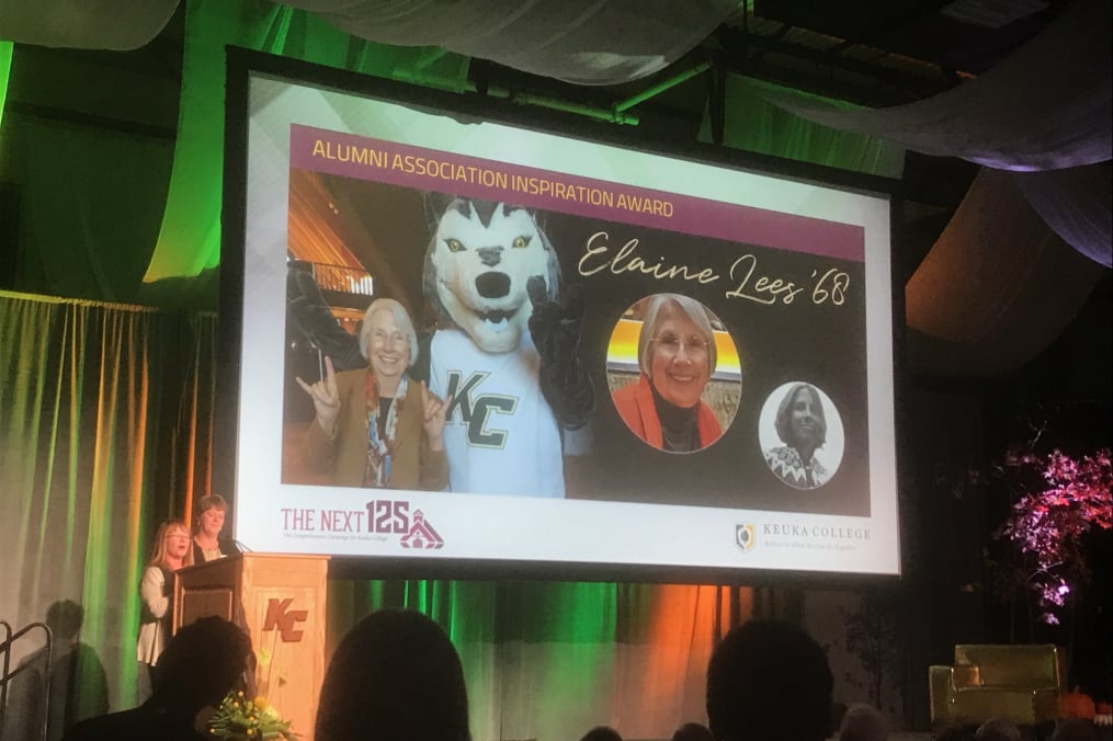 President of the Keuka College Alumni Association Executive Council Chrisy Ahlbert AmEnde '83, left, and Assistant Director of Alumni Relations Laurie Adams '83 present the Alumni Association Inspiration Award to Dr. Elaine O. Lees ’68 posthumously at the Oct. 13 Green & Gold Celebration Weekend gala.
