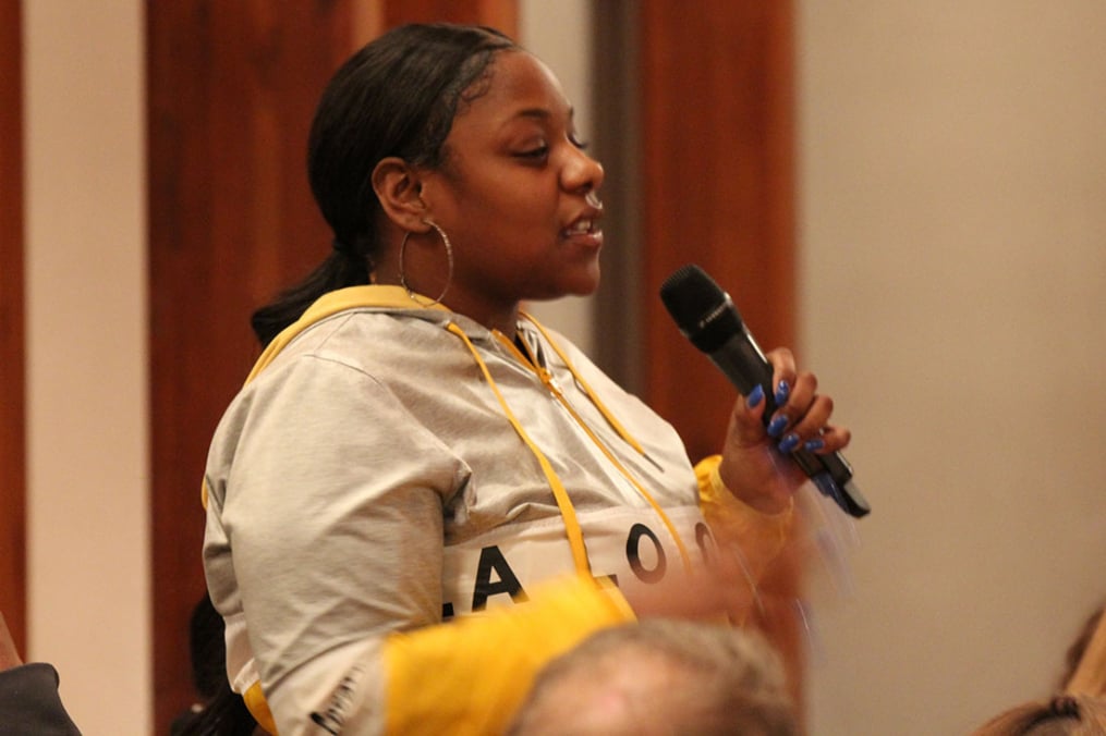 A student asks a question during the post-production Q & A session.