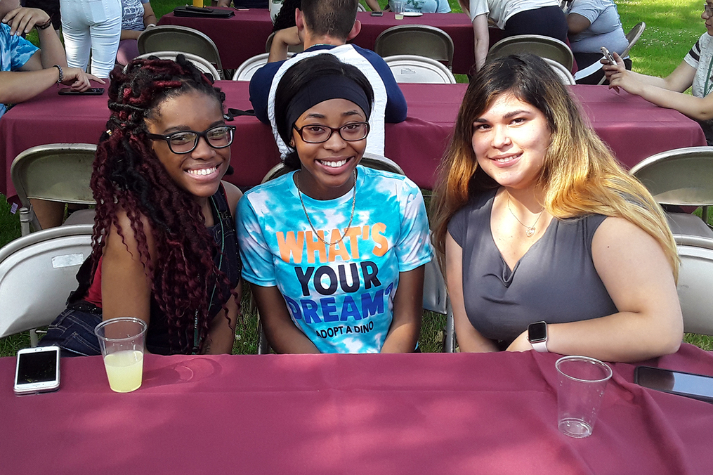 Group of three girls at a HEOP event