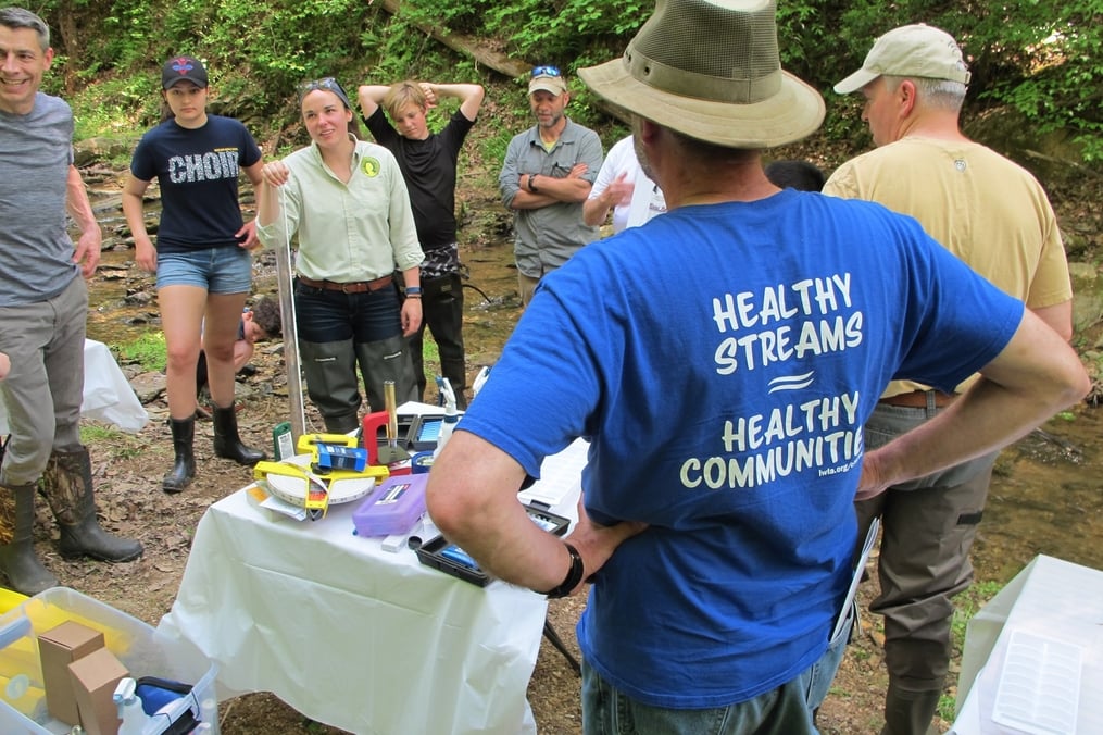 students watching at a stream