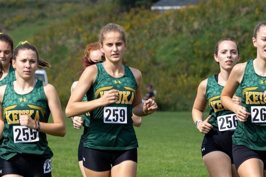 Keuka College cross country athletes in competition 