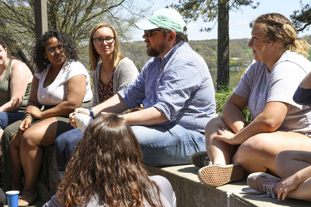 Dr. Koberstein holds lecture outside 