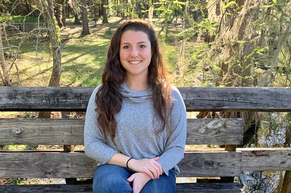 Brianna Coia sitting on a bench