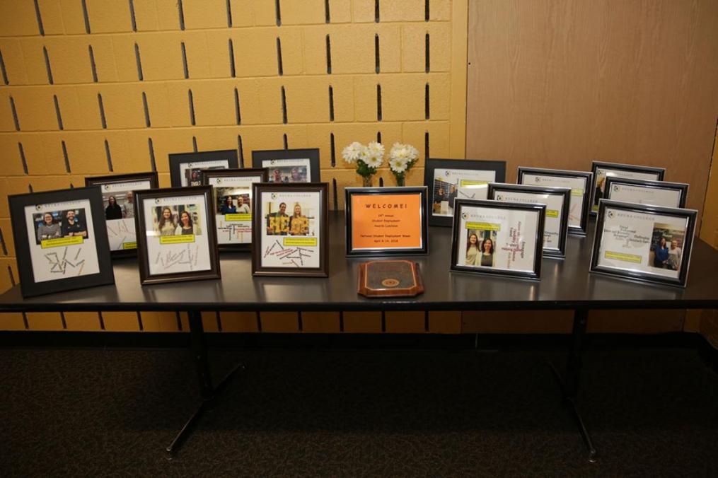 The nominees for Student Employee of the Year and Work Study Supervisor of the Year were each presented a framed photo of themselves with their nominator. Around the photo are some words used to describe each nominee.