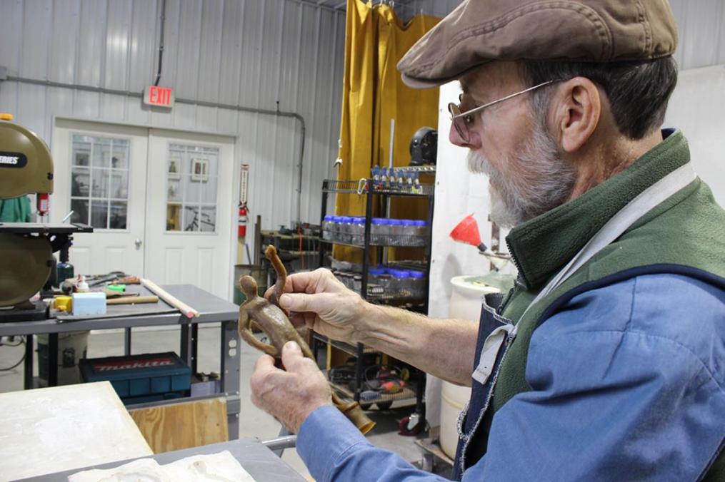 Sculptor Dexter Benedict begins his creations with a wax mold