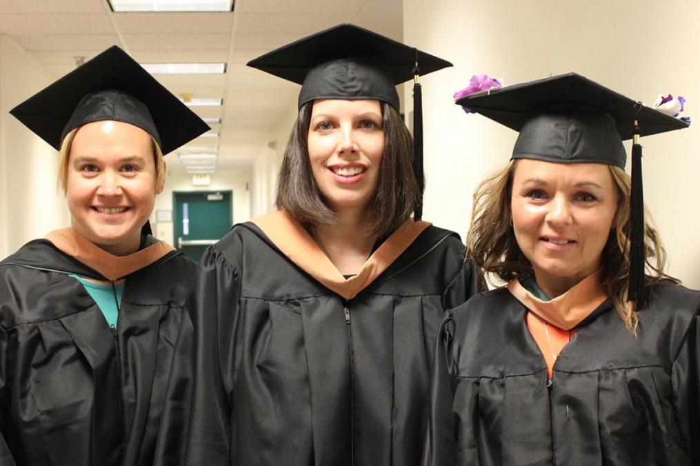 MSM grads, from left, Rena Terwilliger, Jenn Rivers, and Autumn Norman share a moment.
