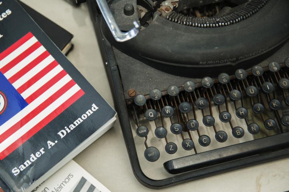 Dr. Diamond's first book, which was nominated for a Pulitzer Prize in history, and his first typewriter. 