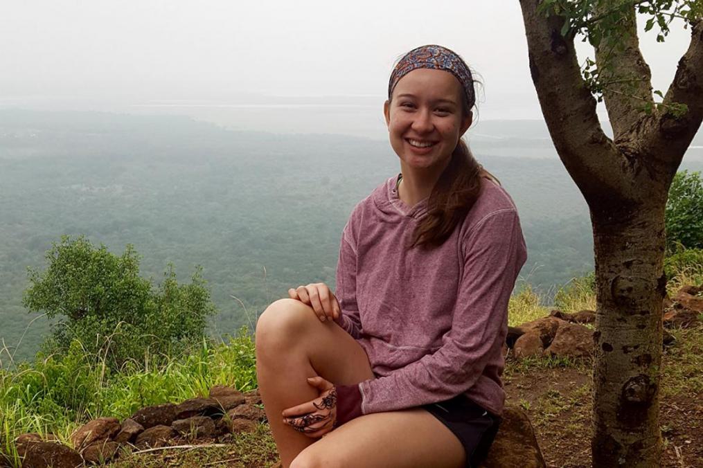 Tessa Alianell posing on a mountain