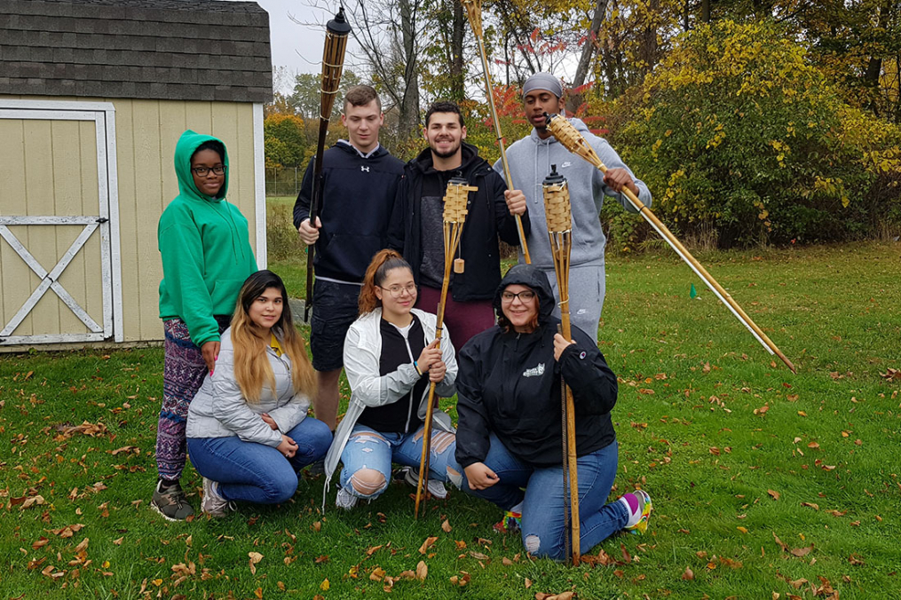 These Keuka College students, helping out at Camp Cory, were among the 44 members of the College community participating in Make a Difference Day. 