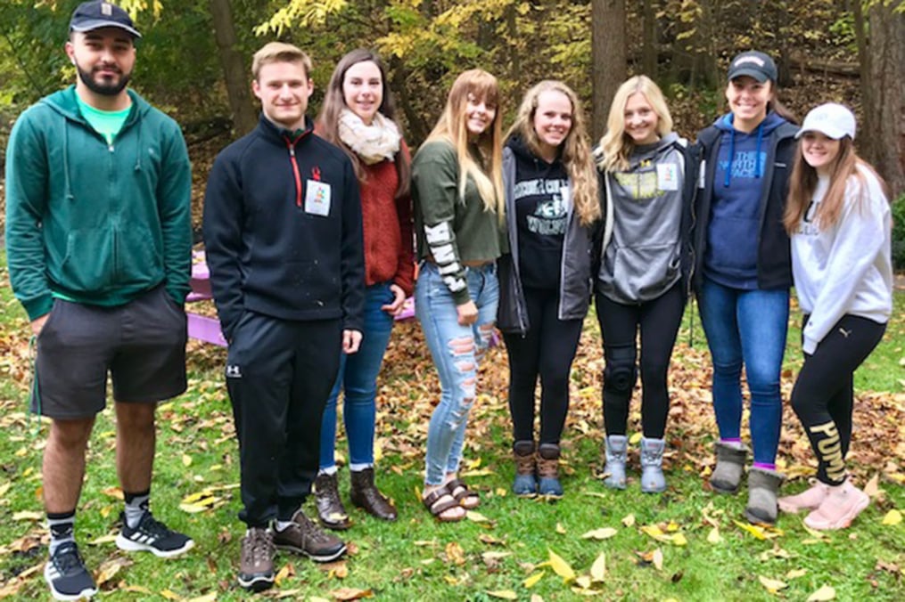 These Keuka College students, helping out at Camp Good Days, were among the 44 members of the College community participating in Make a Difference Day. 