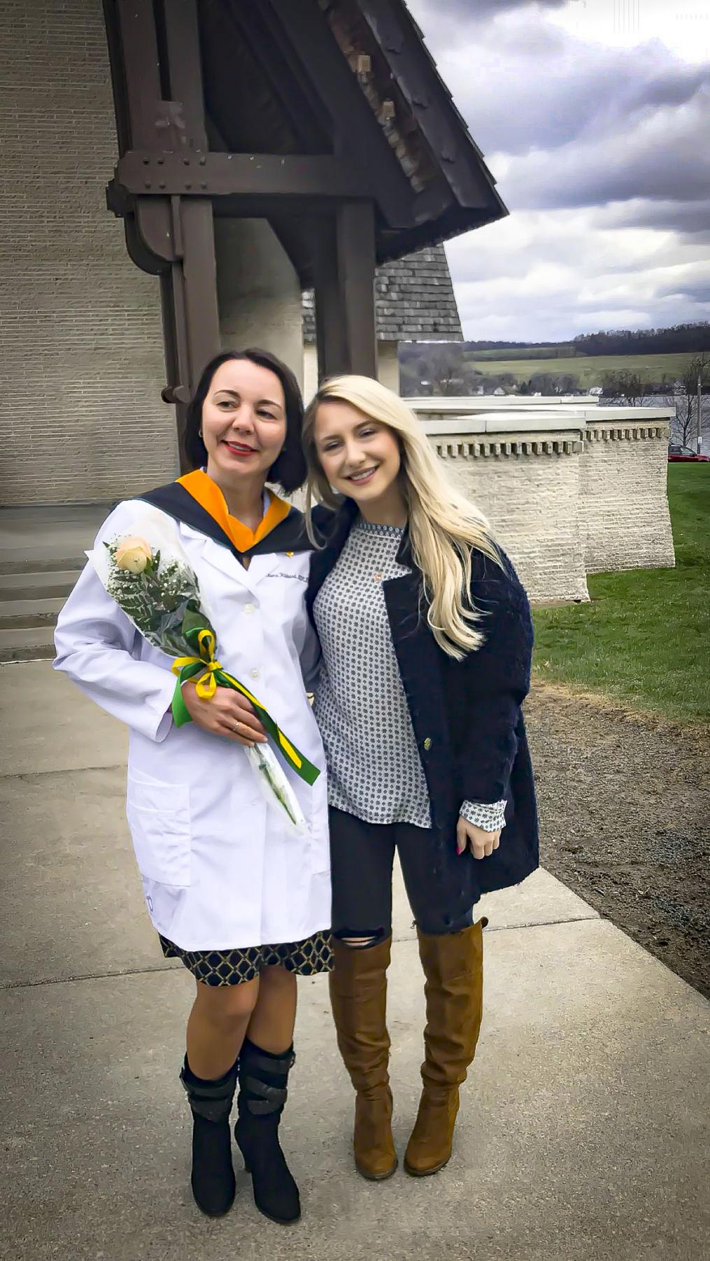 Elena Hibbard and Diana Luzhetskaya, her youngest daughter, outside Keuka College's Norton Chapel after the Division of Nursing hooding ceremony.