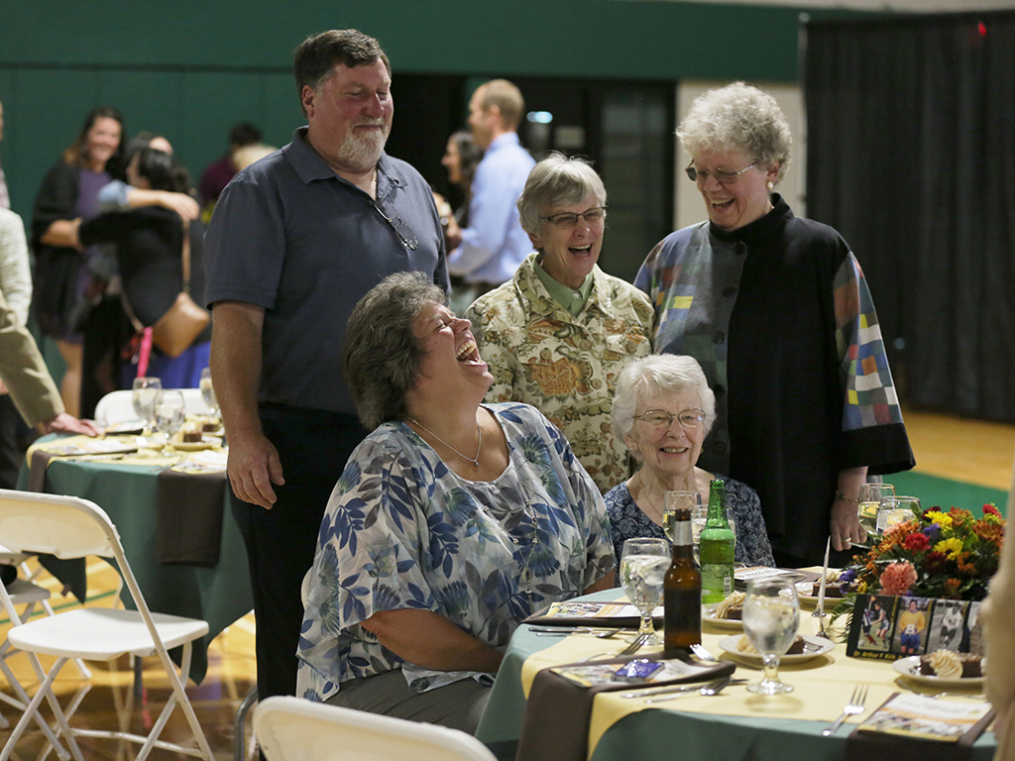 Dr. Arthur F. Kirk, Jr. Athletics Hall of Fame inductee Mary Schleiermacher, center, celebrates at the Hall of Fame Induction & Dinner Friday night with friends including Joan Magnuson, far right. 