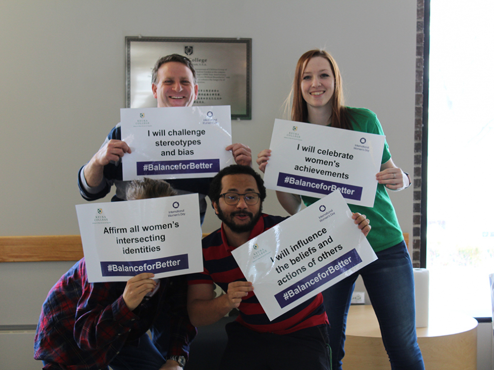 Keuka College students, faculty, staff, and supporters commemorated International Women's Day on Friday, March 8, by taking photos with “selfie cards” proclaiming strategies for progress.