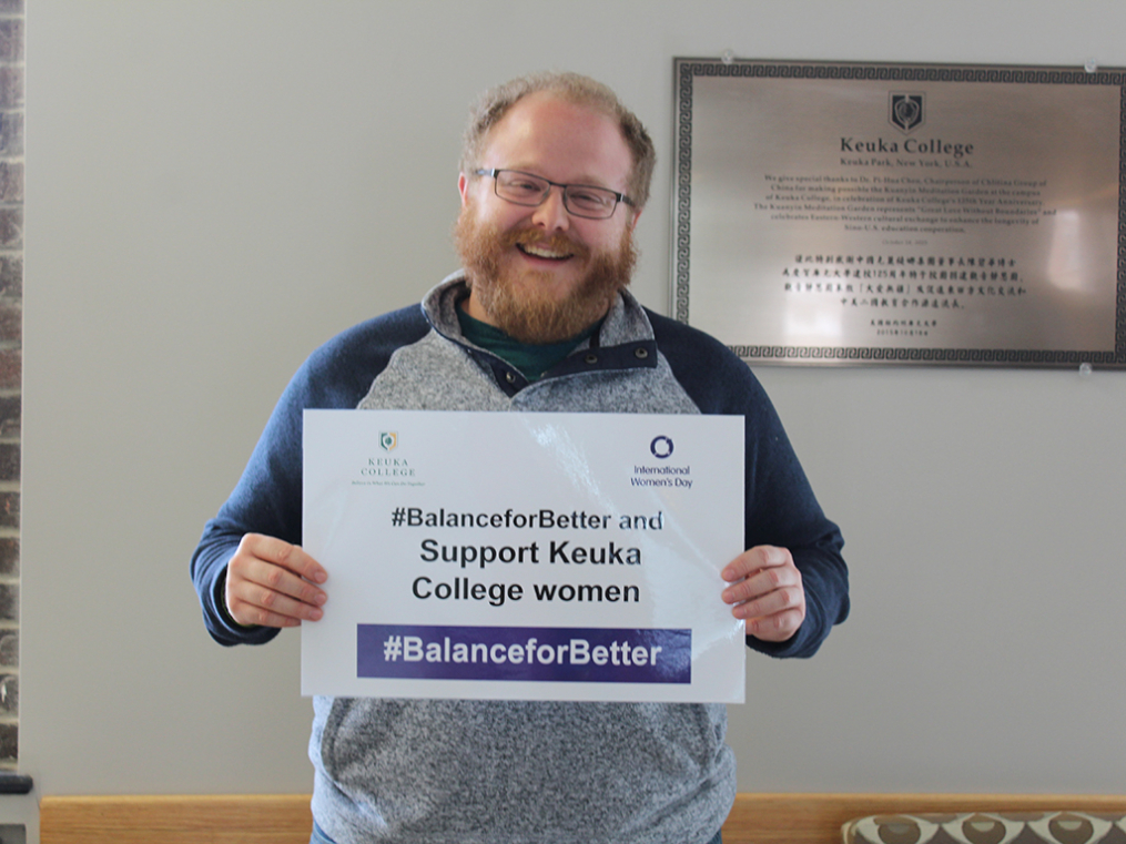 Keuka College students, faculty, staff, and supporters commemorated International Women's Day on Friday, March 8, by taking photos with “selfie cards” proclaiming strategies for progress.