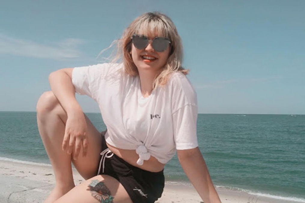 Olivia Ennist '20, takes a break by the blue waters near the site of the Lost Colony of Roanoke, what is now North Carolina's Outer Banks.