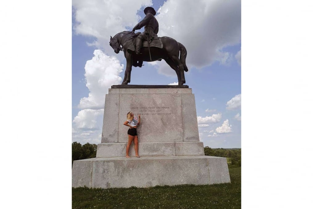 Olivia Ennist '20 spent some time in Gettysburg, Pa. and toured it battle sites, cemeteries, and monuments. Here, she stands next to a monument to Oliver Otis Howard. A Union general in the American Civil War, he fought from the first battle of Bull Run through the Gettysburg campaign.