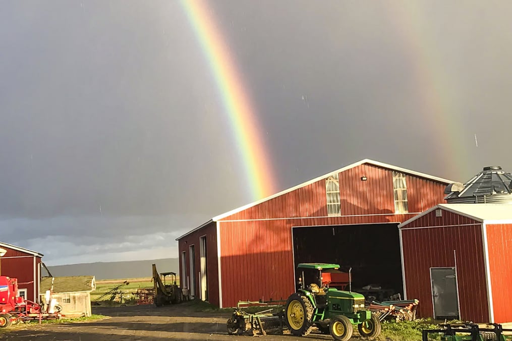 A double rainbow falls over Lakeview Organic Farm, owned by Klass and Mary-Howell Martens.