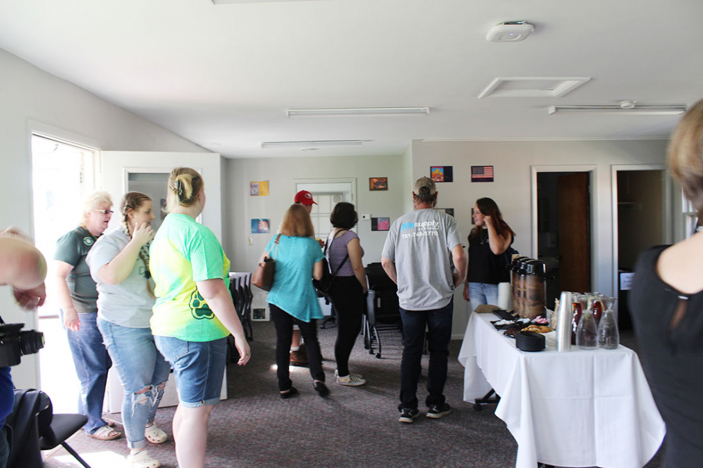 Students, faculty, staff, and guests tour the new American Sign Language/ASL English Interpreting facility in the South Complex following a formal ribbon-cutting on Saturday, Sept. 28. 