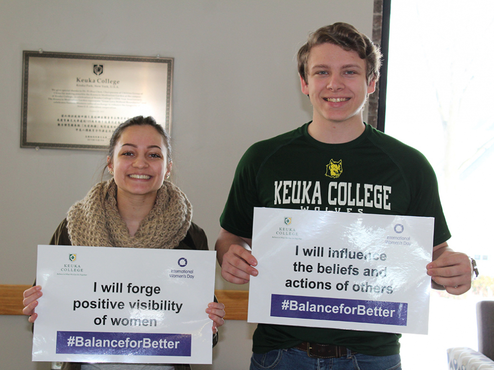 Keuka College students, faculty, staff, and supporters commemorated International Women's Day on Friday, March 8, by taking photos with “selfie cards” proclaiming strategies for progress.