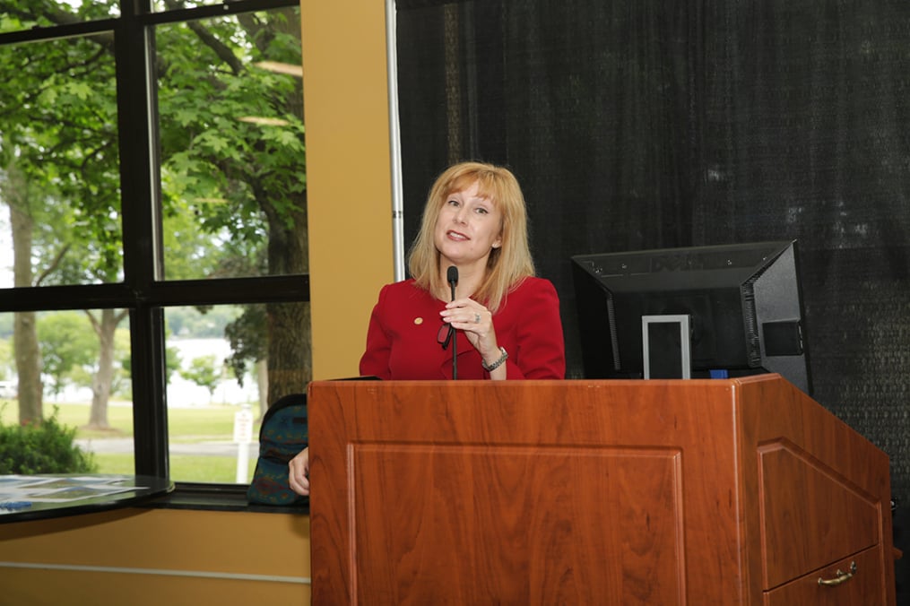 Keuka College Vice President for Advancement and External Affairs Amy Storey addresses the audience on Wednesday, June 20, at the College-hosted Community Luncheon in the Geiser Dining Commons.
