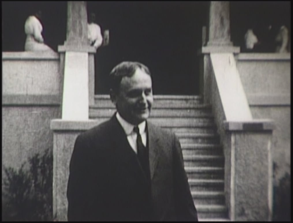 Keuka College President Joseph Serena was not only a backer of "Wheat and Tares," but one of its supporting players. He's shown here in a scene from the movie that was shot outside of Ball Hall.