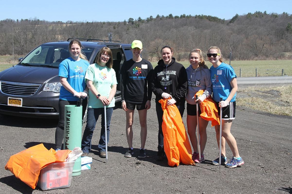students picking up trash